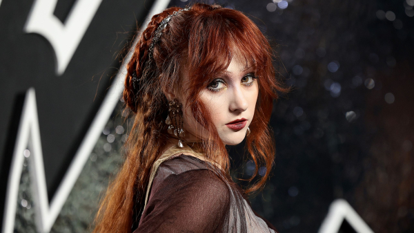 Chappell Roan wears her red hair in a halfup braided style at the VMA Awards.